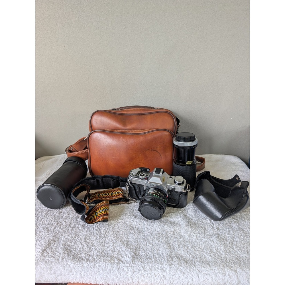 Canon AE-1 35mm SLR Film Camera 50mm f/1.8 FD Lens Case, Extra Lens Hippie Strap